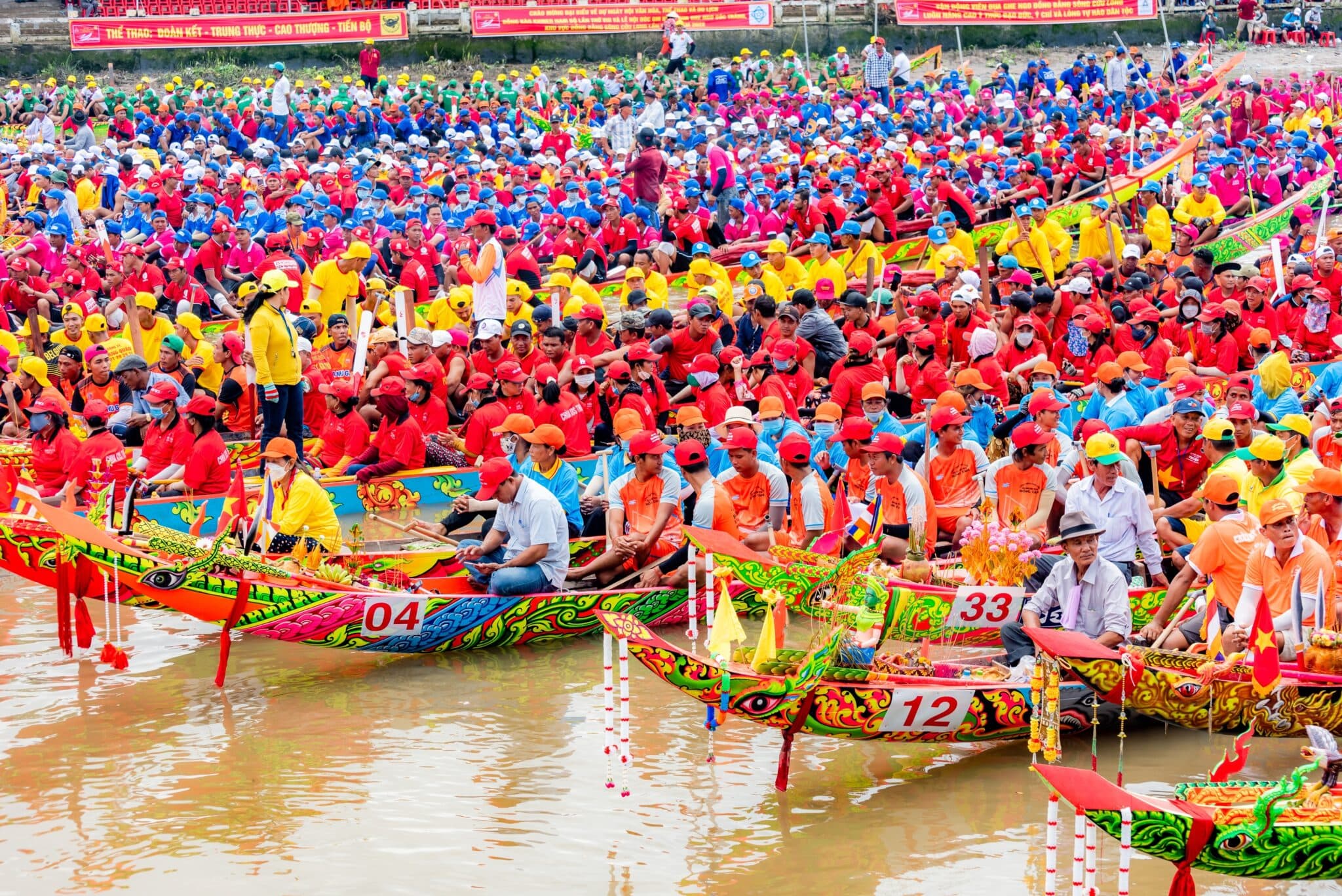 racing in rhythm on the Tonlé Sap River BudgetBro travel budget app