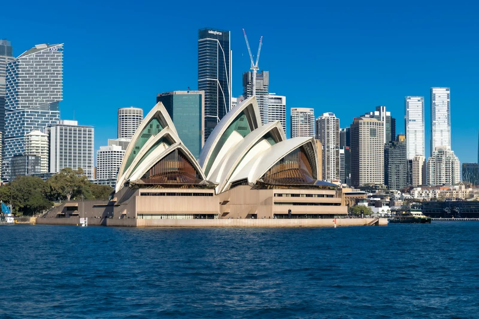 Sydney Opera House and the city skyline seen across the harbour, Australia | BudgetBro