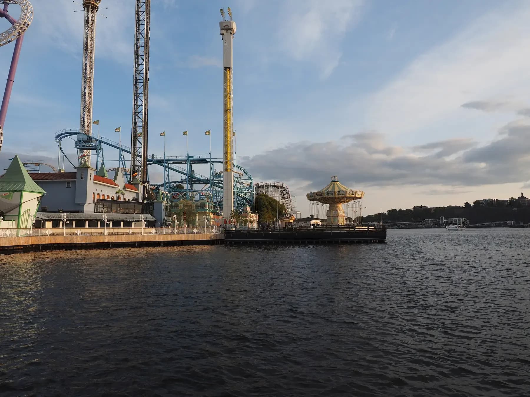 Gröna Lund on Djurgården in Stockholm seen from the water in evening light | BudgetBro