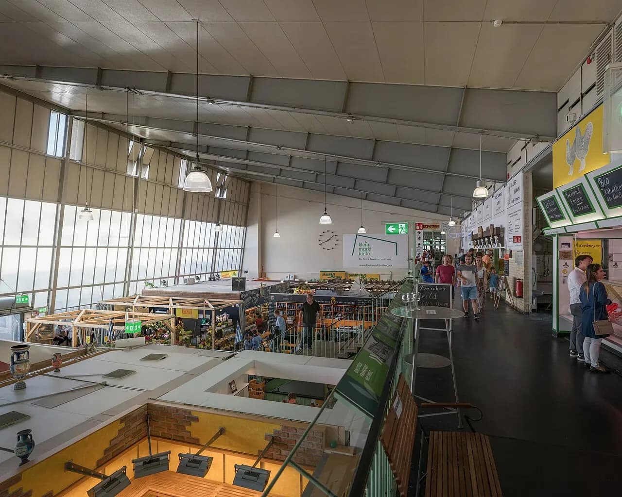 Inside the Kleinmarkthalle in Frankfurt, food stalls seen from the upper gallery | BudgetBro