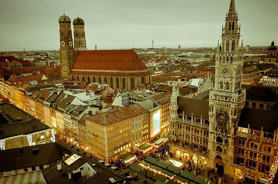Marienplatz in Munich from above at dusk, with the Christmas market lit up | BudgetBro